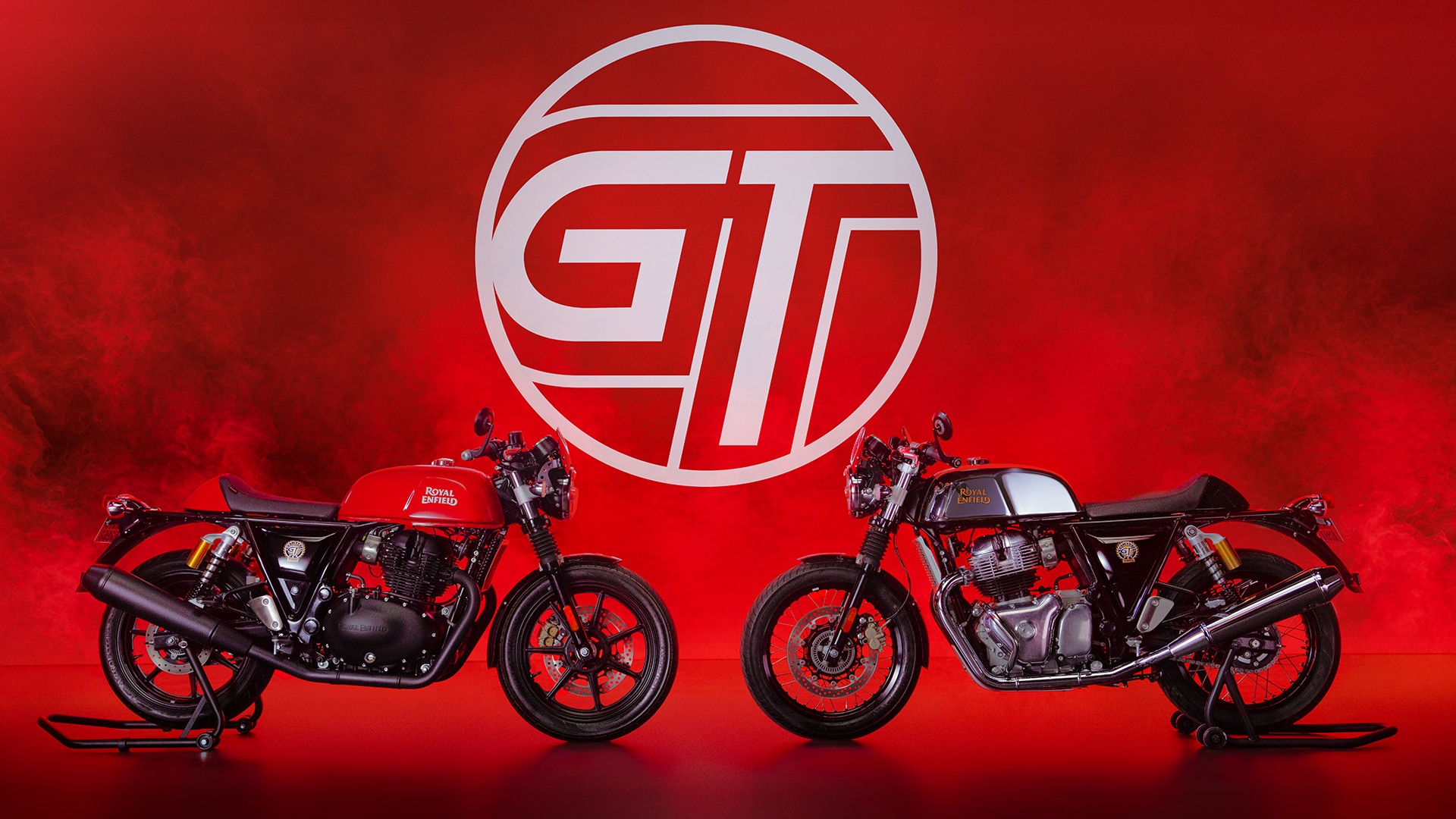 Rocker Red and Mr Clean Continental GT 650 motorcycles facing each other under a GT emblem